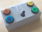 Boxed version of Small Joystick with 4 buttons