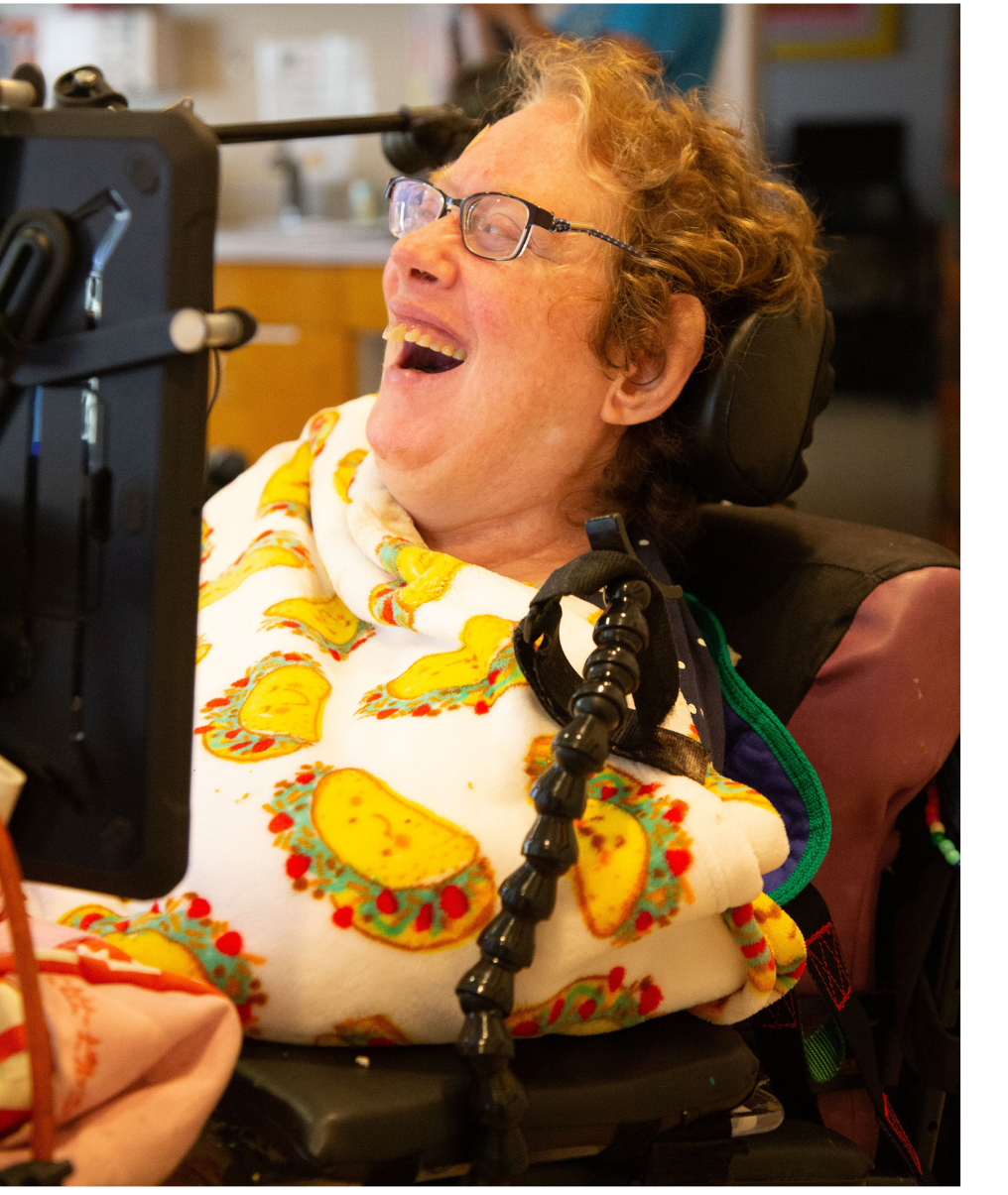 a woman in wheelchair using speakprose