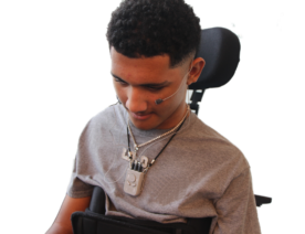 A person on a wheelchair wearing the Kinemo Connect